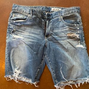 AG Nikki short.  32. Longer distressed cutoffs. Relaxed skinny short.
